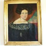 Oil on canvas portrait of Electra Robinson wearing a black dress and lace collar. The frame is molded giltwood. 
Circa 1830