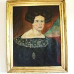 Oil on canvas portrait of Electra Robinson wearing a black dress and lace collar. The frame is molded giltwood. 
Circa 1830