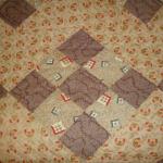 New England patchwork quilt in printed cottons. Very good condition.
Width 74" Length 86" 
