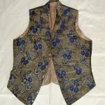 Mans Waistcoat - 

 Man's silk brocade waistcoat with woven floral pattern. Overall excellent condition. Late 18th early 19th Century.
